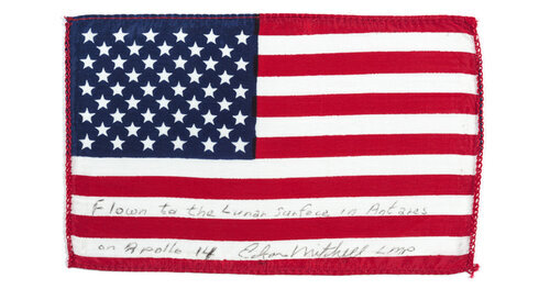 Edgar Mitchell’s flag from Apollo 14, the mission that brought Alan Shepard—the first American in space—down onto the lunar surface.