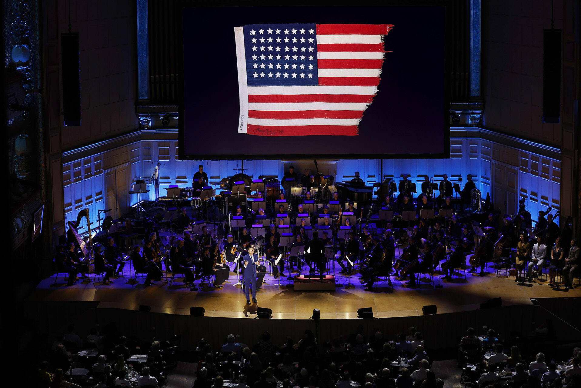 5 29 24 John Monsky with photo of historic flag Winslow Townson